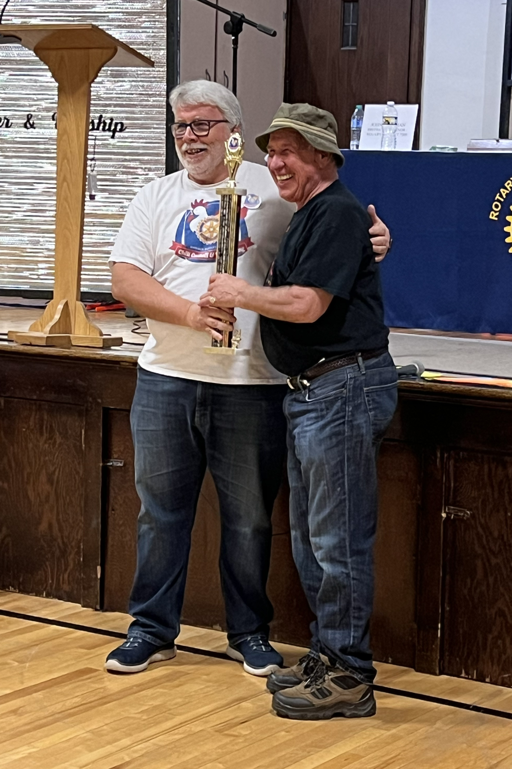 Pictured are Mr. Rich Siniawski and Mr. William F. Caruthers II, as they accept the award for best presentation at the Norwin Rotary Chili Cookoff & Wing Thing.